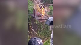 Disaster management teams use zipline to rescue people stranded amid flash flood, heavy rainfall in southern India