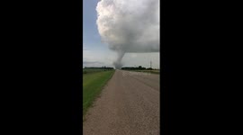 Large tornado rips through Canadian fields