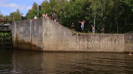 Youths tomb-stoning from a canal lock in Yorkshire during heatwave