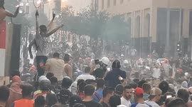 Lebanese celebrate as Prime Minister Hassan Diab announces resignation