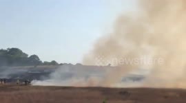 UK: Large Blaze In Field Near Horsham, West Sussex