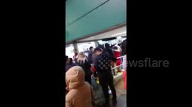 Locals seen queueing outside store in Auckland as city goes back into lockdown