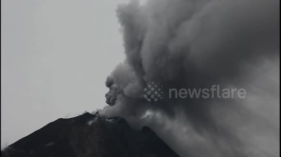 Sinabung volcano seen spewing fresh ash after recent eruption in Indonesia