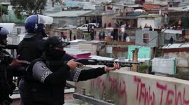 Police and security clash with squatters over land in South Africa