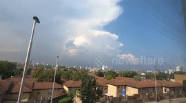 Billowing storm clouds brew over London during August 2020 heatwave time lapse