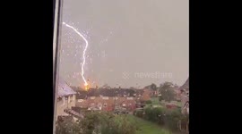 Terrified neighbour captures moment lightning strikes house in Wales