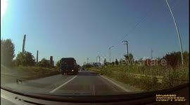 Driver has close call caught on dashcam against oncoming overtake