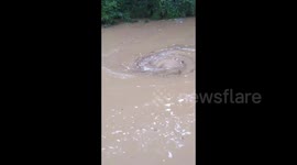 Vortex appears in swollen creek in Virginia