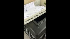 Put undelivered mail left on trash into mailbox