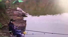 Fishermen run away seconds before massive wave slams onto shore