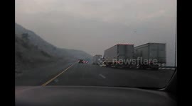 Smoke and ash north bound 5 Fwy Lake Hughes fire day