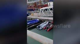 Abandoned boats left behind by migrants who crossed English Channel