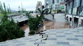 Huge sinkhole opens up swallowing dozens of vehicles in China