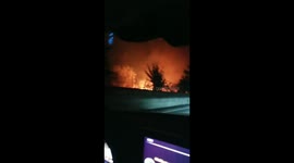 Homes and property in flames as we leave area