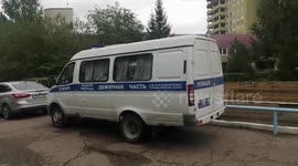 Police officers in the hospital where Navalny is lying