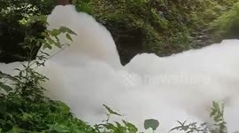Residents baffled by foam forming on river in the Philippines