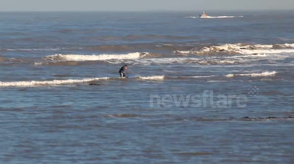 Fisherman Stranded On Rocks On Scarborough Seafront