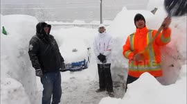 Cheerful residents of Canadian town buried under record snowfall