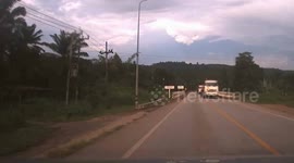 Wood Flies From Truck Hitting Car