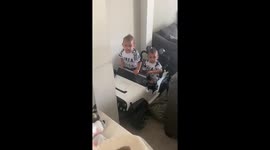 Jerron and Joshua are driving there power wheel to Popeyes