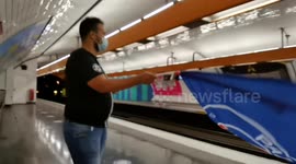 Paris metro, a fan showing his support (part of a series of videos about the UEFA Champions League final, watching the live broadcast at Parc des Princes, Paris, after having hitchhiked for 200 km, getting offered a ticket on match day)