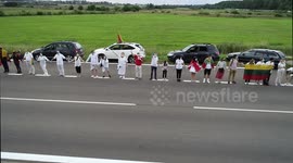 Lithuanians form 32 km long human chain in solidarity with Belarus protesters