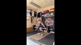 Girl Failing A Weight Lifting Attempt