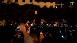 Crowd heard screaming as police detain protester during anti-Trump rally in Washington, D.C.