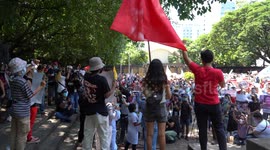 Protesters condemn Filipino President Duterte's government during remembrance holiday