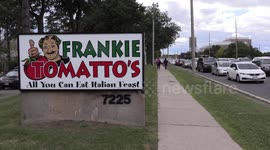 Thousands line up for miles for pizza as iconic Italian restaurant in Markham near Toronto closes due to COVID 19 recession and worsening economy