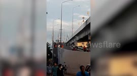 Dozens of teenagers 'break Covid-19 restrictions' to exercise on bridge in the Philippines