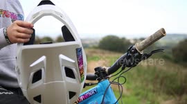 A British nine-year-old is one of the world's best mountain bikers and performs massive jumps of nearly 50ft