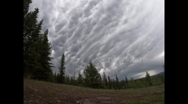 Mammatus clouds began to build overhead and move towards the city