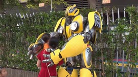 Chinese father wears self-made 'Transformers' costume to surprise son in kindergarten