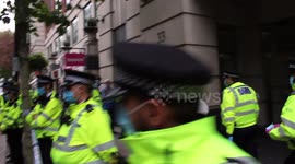 Man who glued himself to the department of transport arrested