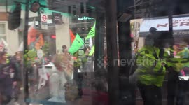 bus stuck in crowds of extinction rebellion protestors outside the home office
