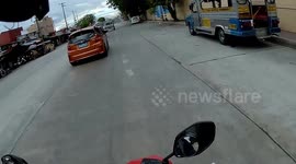 Loose Tire Hits Oncoming Motorbike
