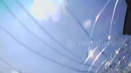 Loose metal flies off truck and smashes car windscreen in Thailand