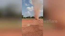 Terrifying moment dust devil interrupts basketball game in Taiwan