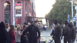 Scuffles erupt as masked police officers detain protesters in Minsk