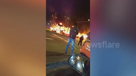 Bus engulfed in flames as violence erupts in Bogota over taxi driver's death