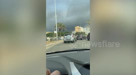 Driver shocked at smoke from fire in Beirut, Lebanon