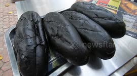 Bizarre one-of-a-kind charcoal-like black bread made in Vietnam