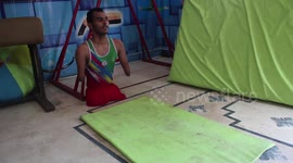 Disabled man with no legs and arms is a successful gymnast