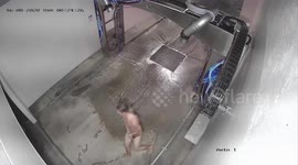 Bizarre moment Australian man showers NAKED in car wash