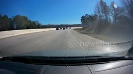 Jeep makes last second decision to cross all lanes and causes a roll over accident