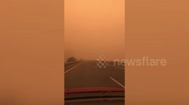 Motorist drives through haze from Oregon fires