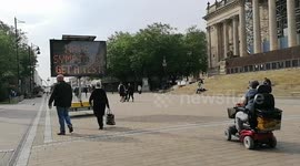 Sign in Bolton Warns Shoppers of Covid