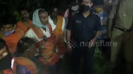 Indian couple left stranded after heavy rainfall causes river to swell