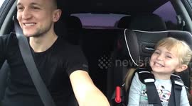 Daddy and daughter sing along to 